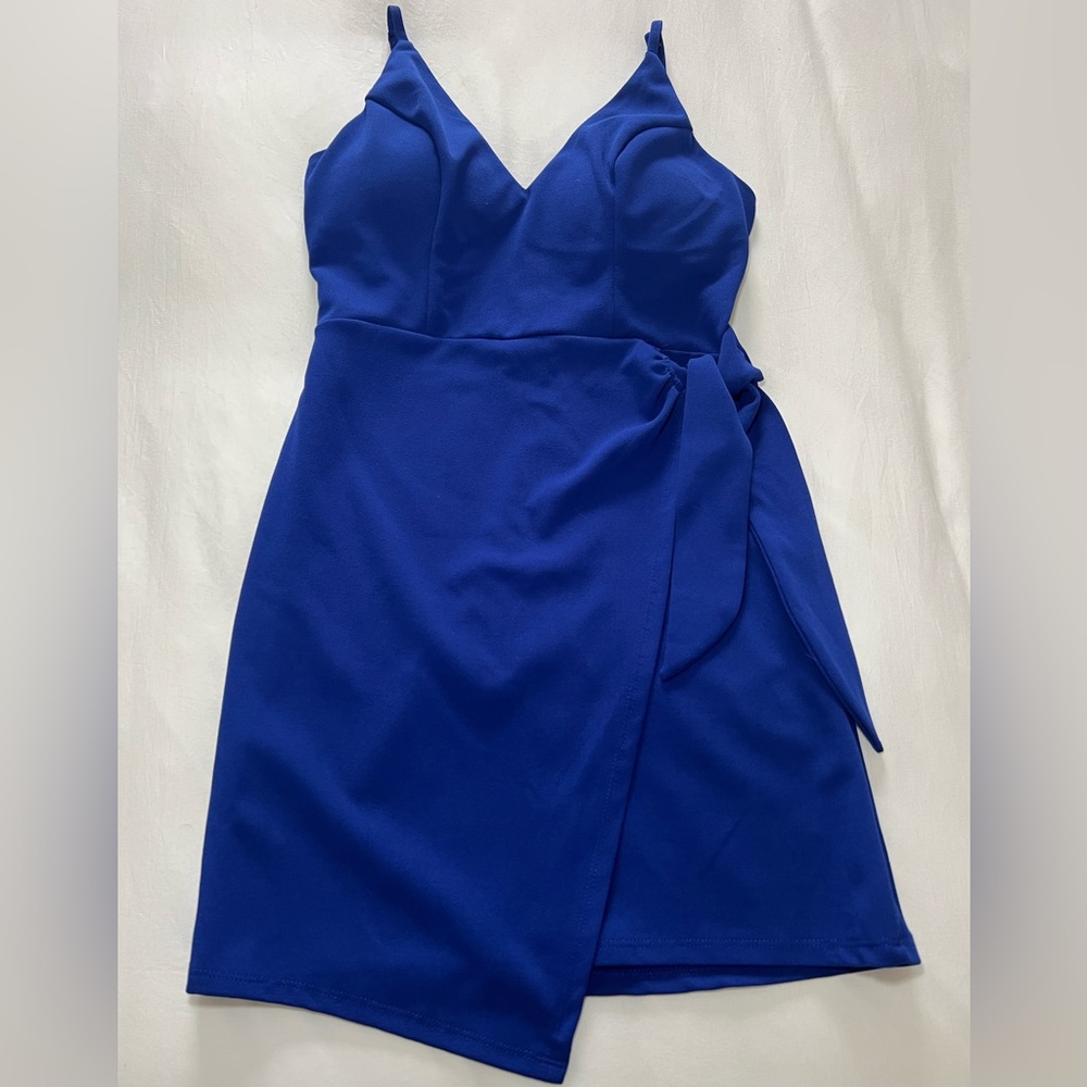 Medium asymmetrical dark blue dress.